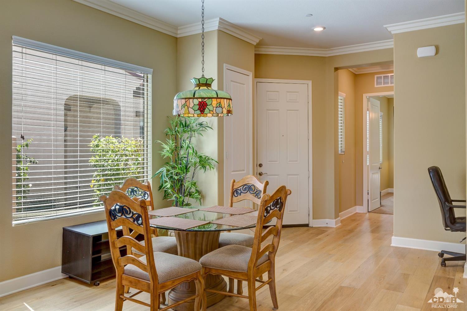 81340 Corte Compras Indio, CA 92203 - Photo 6 of 43 a view of a dining room with furniture and window