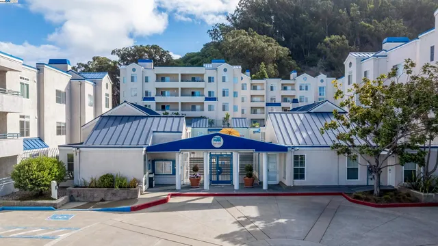 a front view of a building with street view