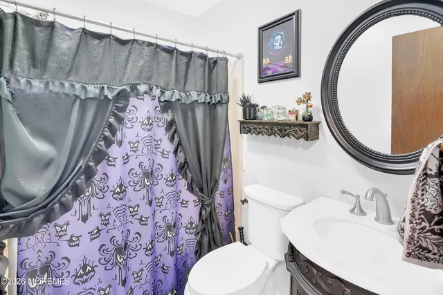 an aerial view of residential house with an outdoor space