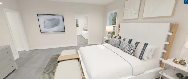 a bed room with a bed and a couch