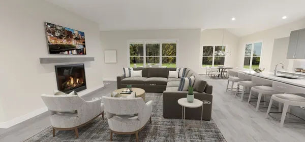 a living room with furniture a window and a fireplace