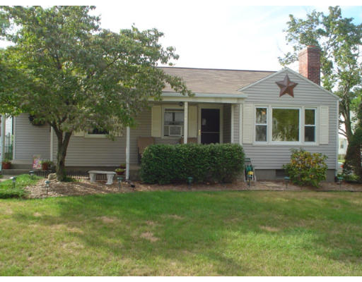 1012 Carew Street Springfield, MA 01104 - Photo 1 of 11 a front view of house with yard and green space