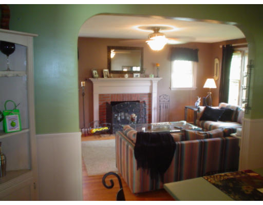 1012 Carew Street Springfield, MA 01104 - Photo 4 of 11 a living room with furniture and a fireplace