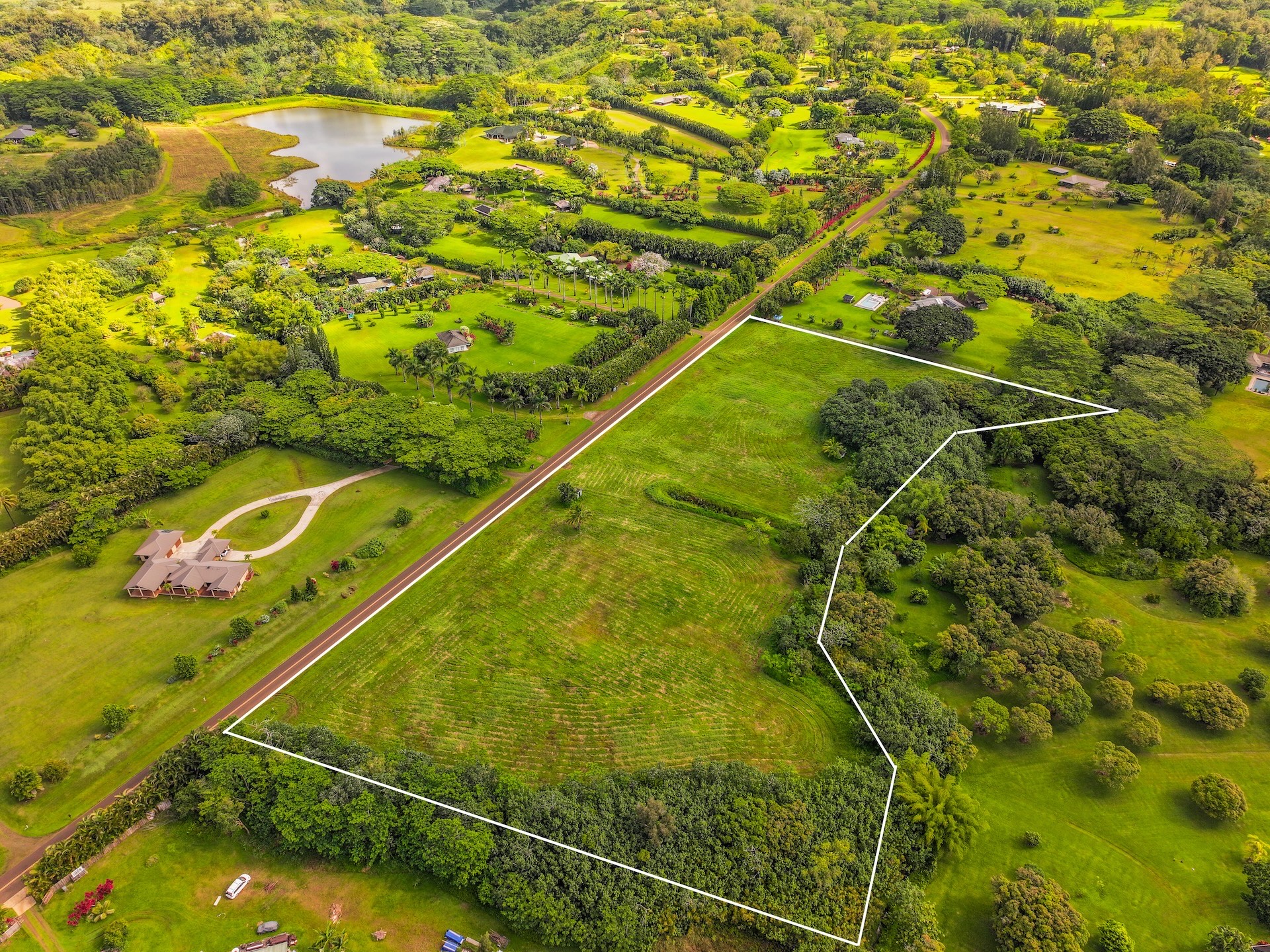 4 Kahiliholo Road, Unit 4 Kilauea, HI 96754 - Photo 13 of 13 a view of a yard
