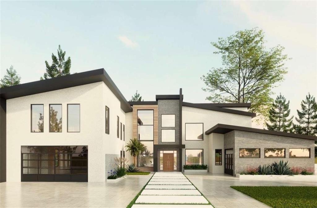 a view of a white house with large windows