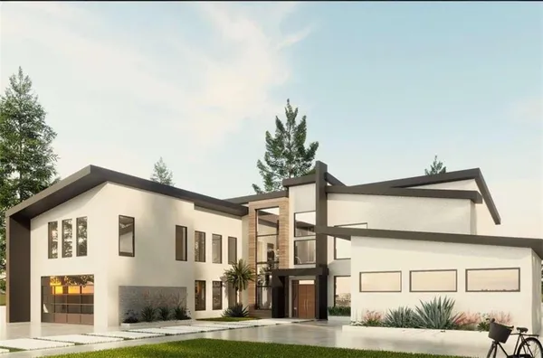 a view of residential houses with street