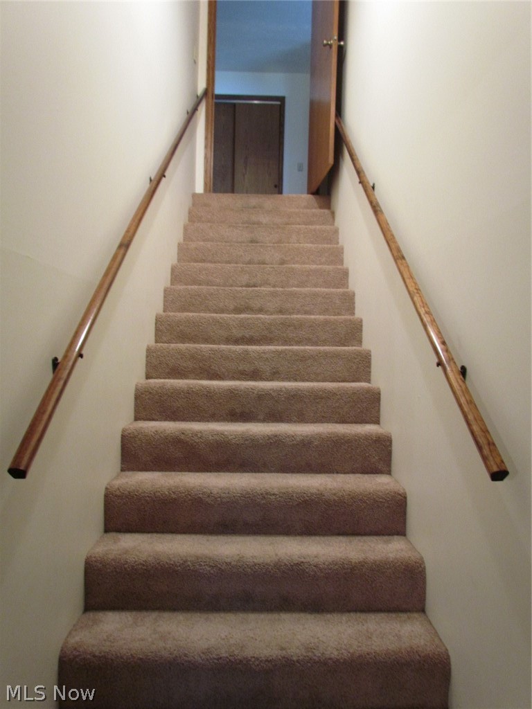 10174 Veto Road Belpre, OH 45714 - Photo 28 of 45 View of stairway going down to lower level.