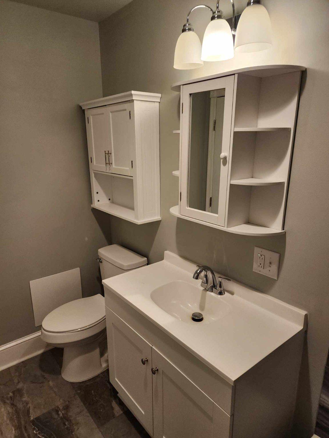 522 South Broadway Pitman, NJ 08071 - Photo 20 of 26 Upper Hall bathroom with sleek fixtures.