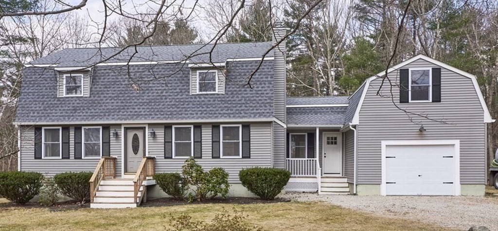 75 J J Davis Road Charlton, MA 01507 - Photo 1 of 33 a front view of a house with a yard