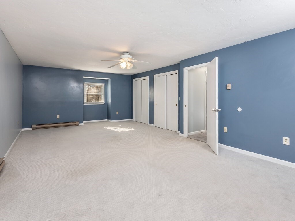 75 J J Davis Road Charlton, MA 01507 - Photo 24 of 33 a view of a livingroom with a staircase