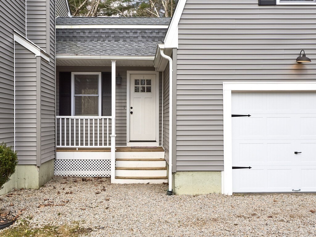 75 J J Davis Road Charlton, MA 01507 - Photo 3 of 33 a view of a house with a door and a yard