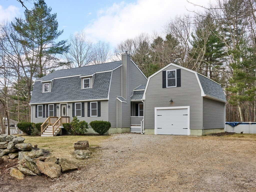 75 J J Davis Road Charlton, MA 01507 - Photo 4 of 33 a front view of a house with a yard