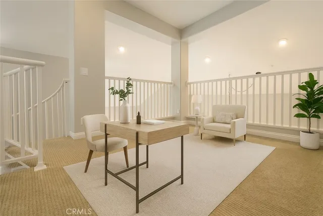 a view of a livingroom with furniture and wooden floor