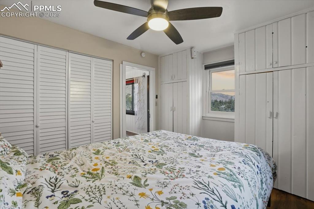 9445 Mohawk Trail Cascade, CO 80809 - Photo 26 of 47 a bedroom with a bed and a window