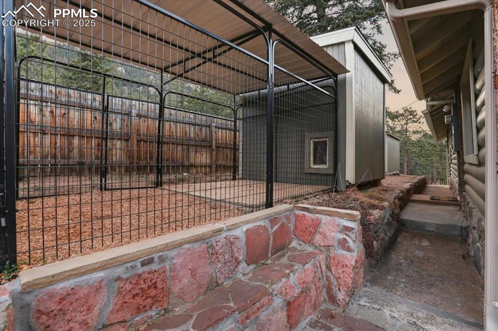 9445 Mohawk Trail Cascade, CO 80809 - Photo 31 of 47 a view of backyard with tub