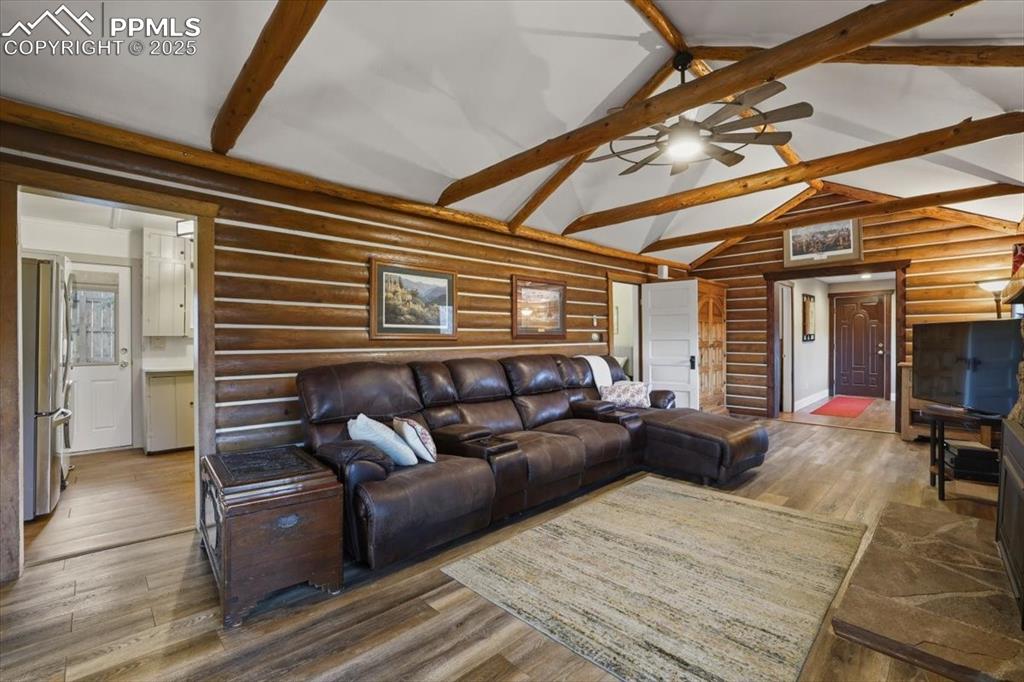 9445 Mohawk Trail Cascade, CO 80809 - Photo 9 of 47 a outdoor living space with furniture and a ceiling fan