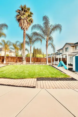 a view of a house with a swimming pool