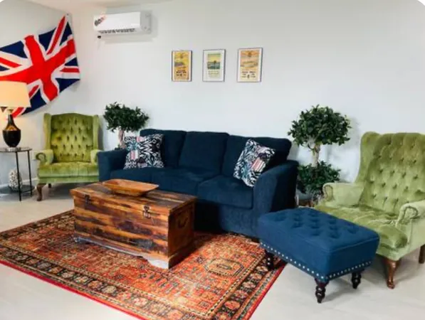 a living room with furniture rug and a couch