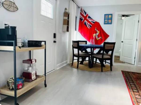 a view of dining room with furniture and front door