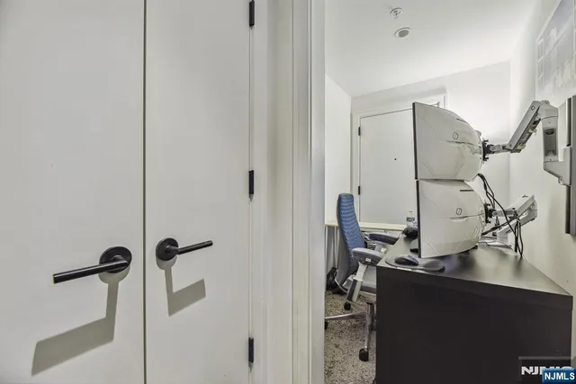 a close view of a utility room with washer and dryer