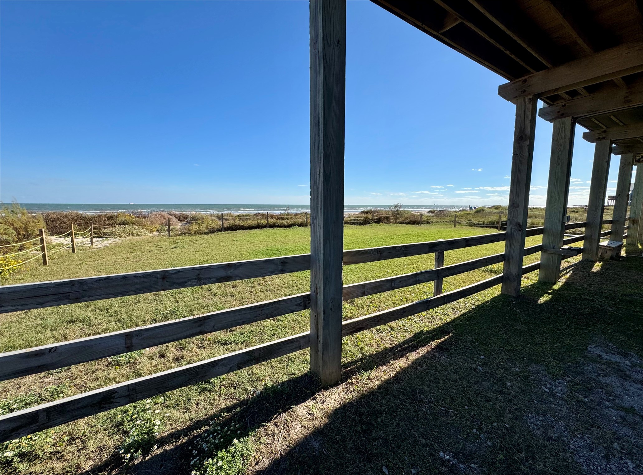 101 Salt Grass Avenue Surfside Beach, TX 77541 - Photo 35 of 48 a view of ocean from a balcony