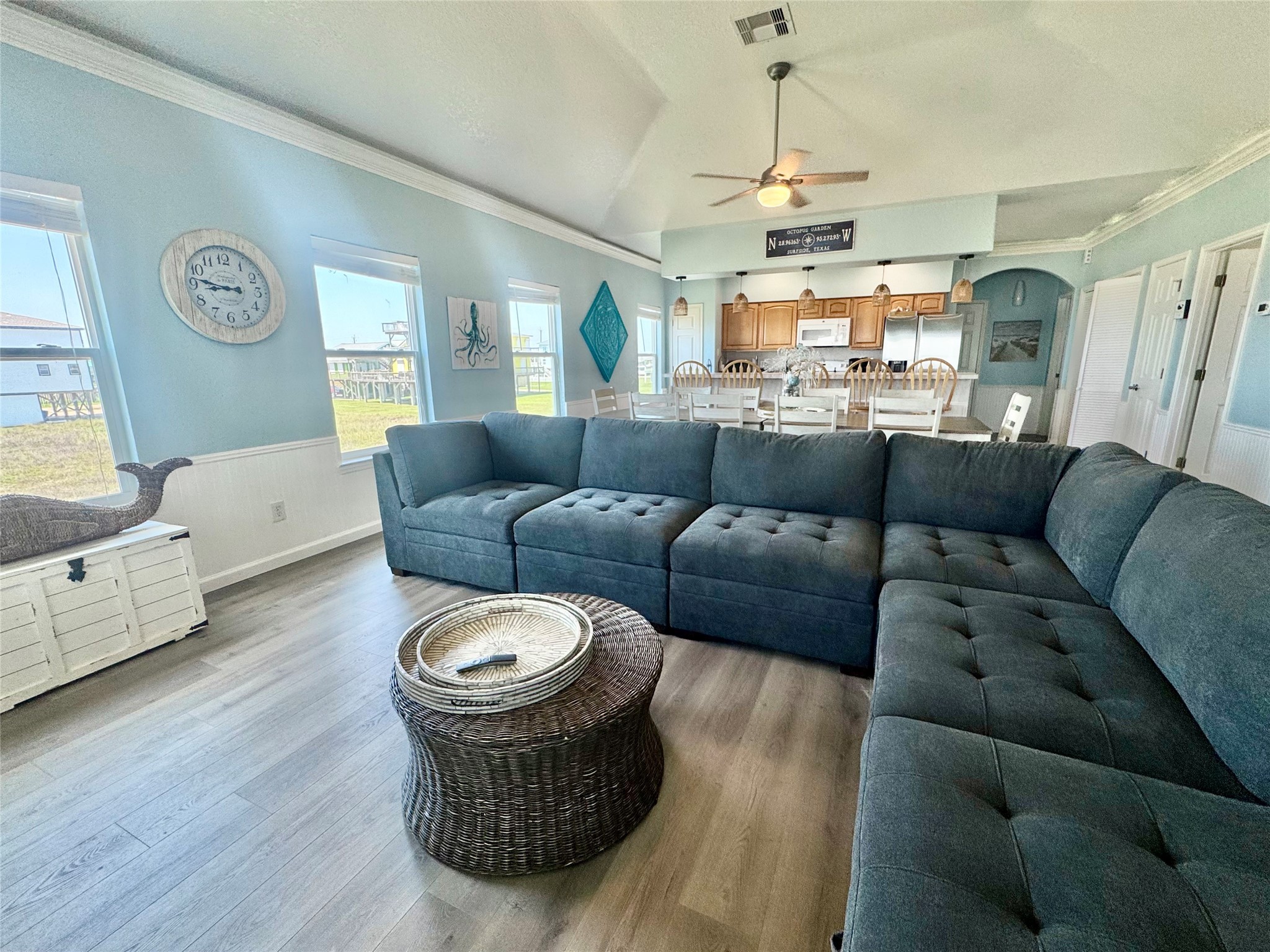 101 Salt Grass Avenue Surfside Beach, TX 77541 - Photo 9 of 48 a living room with furniture a rug and a window