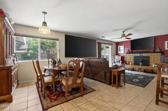 a view of a dining room with furniture window and outside view