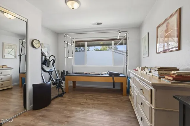 a kitchen with stainless steel appliances granite countertop a stove and a refrigerator
