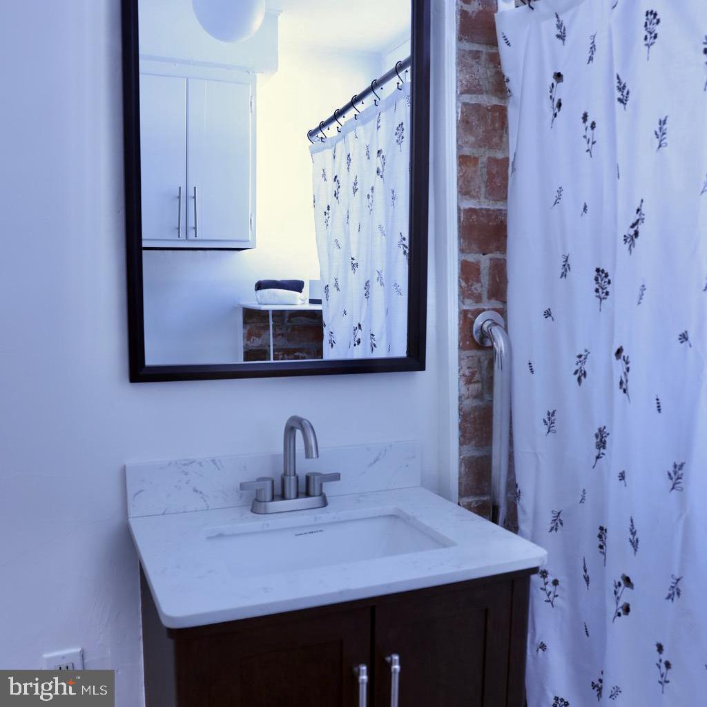 2598 River Road New Hope, PA 18938 - Photo 16 of 24 a bathroom with a sink and a mirror