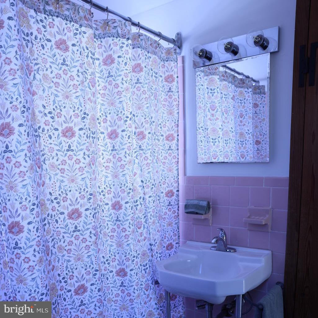 2598 River Road New Hope, PA 18938 - Photo 22 of 24 a bathroom with a sink and a mirror