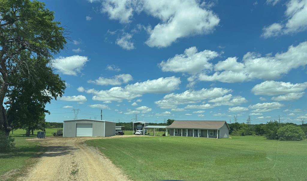 12638 Highway 82 Savoy, TX 75479 - Photo 21 of 21 a view of house with a big yard