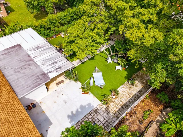 a view of a yard with an outdoor space
