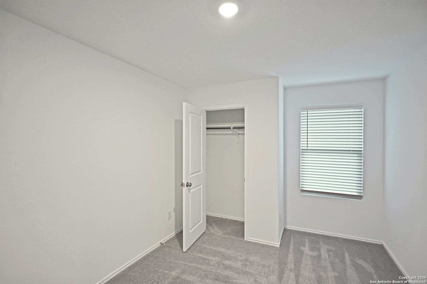 5925 San Geronimo Seguin, TX 78155 - Photo 12 of 29 a view of an empty room with closet and a window