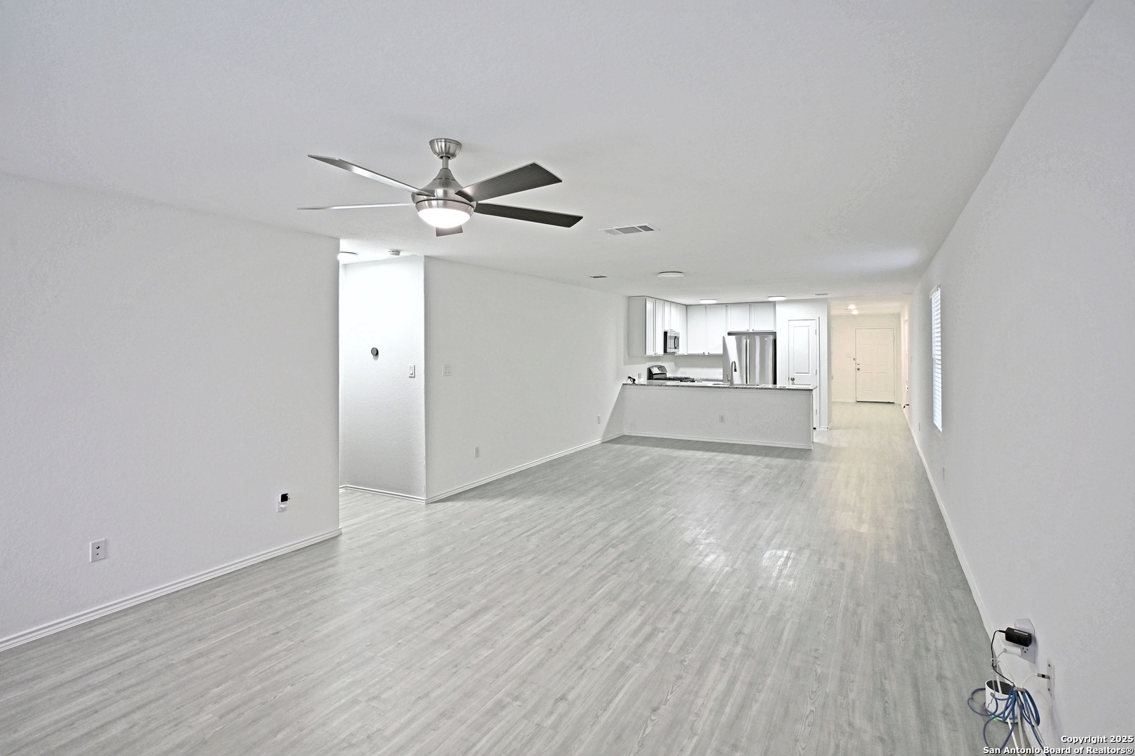 5925 San Geronimo Seguin, TX 78155 - Photo 14 of 29 wooden floor in an empty room with a window