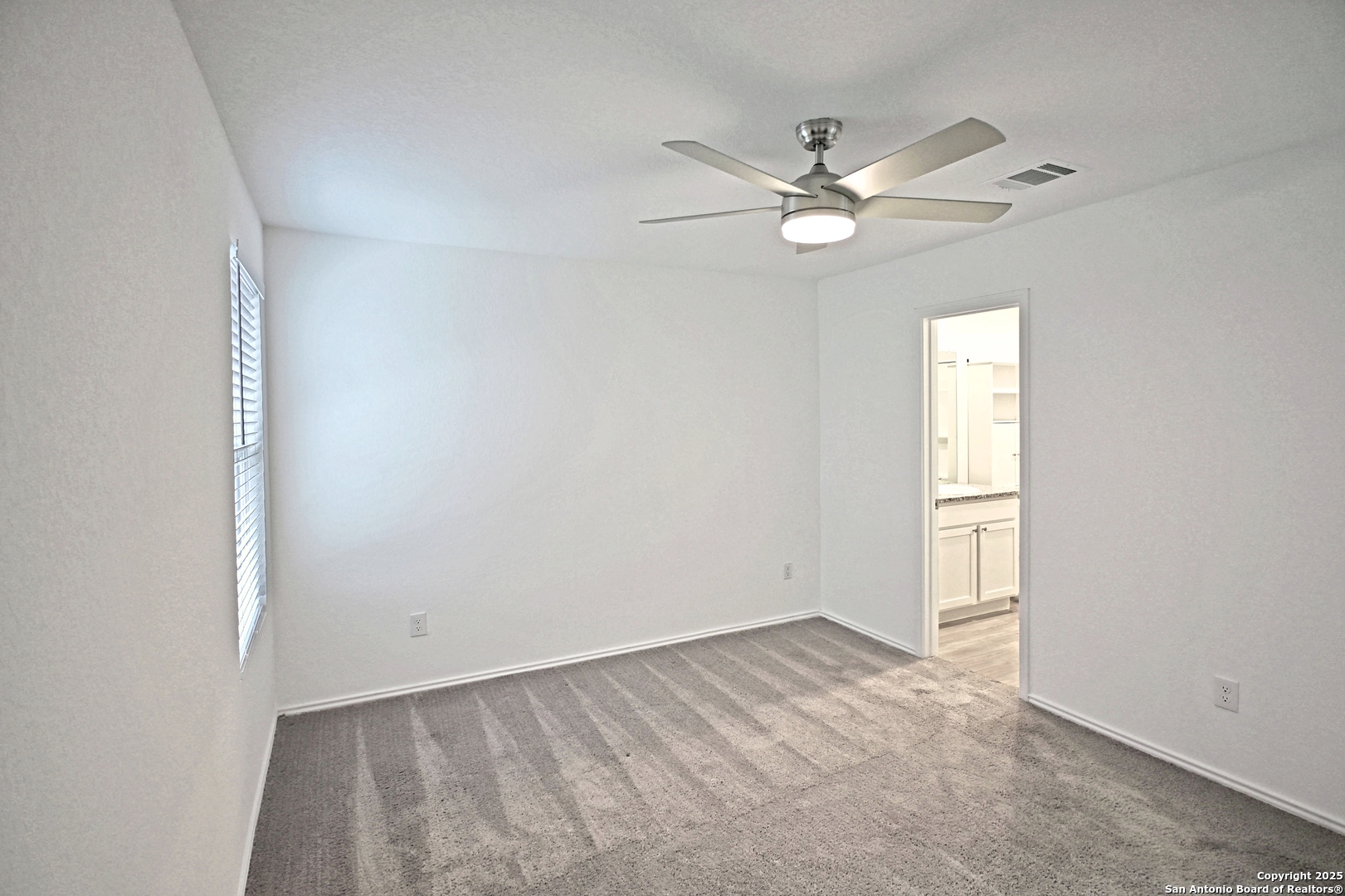 5925 San Geronimo Seguin, TX 78155 - Photo 16 of 29 a view of a livingroom with a ceiling fan and window