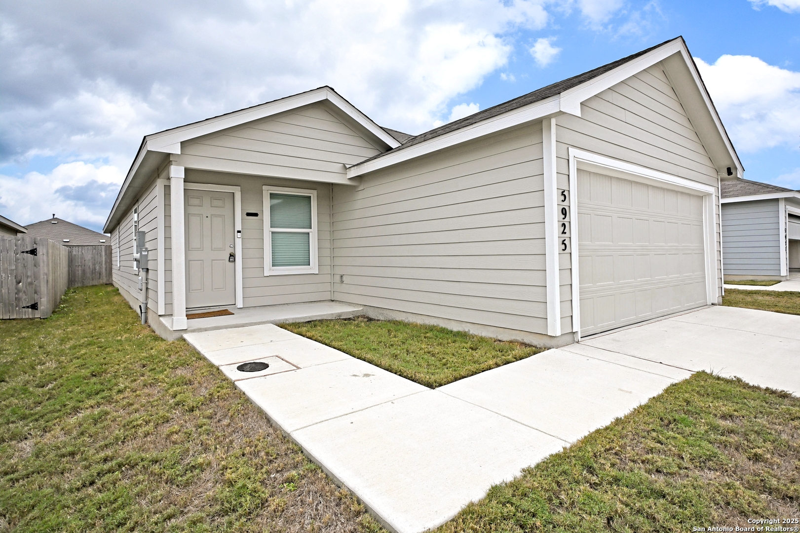 5925 San Geronimo Seguin, TX 78155 - Photo 2 of 29 a front view of a house with white fence