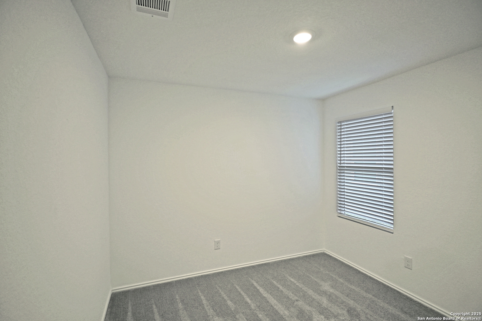 5925 San Geronimo Seguin, TX 78155 - Photo 10 of 29 an empty room with a window