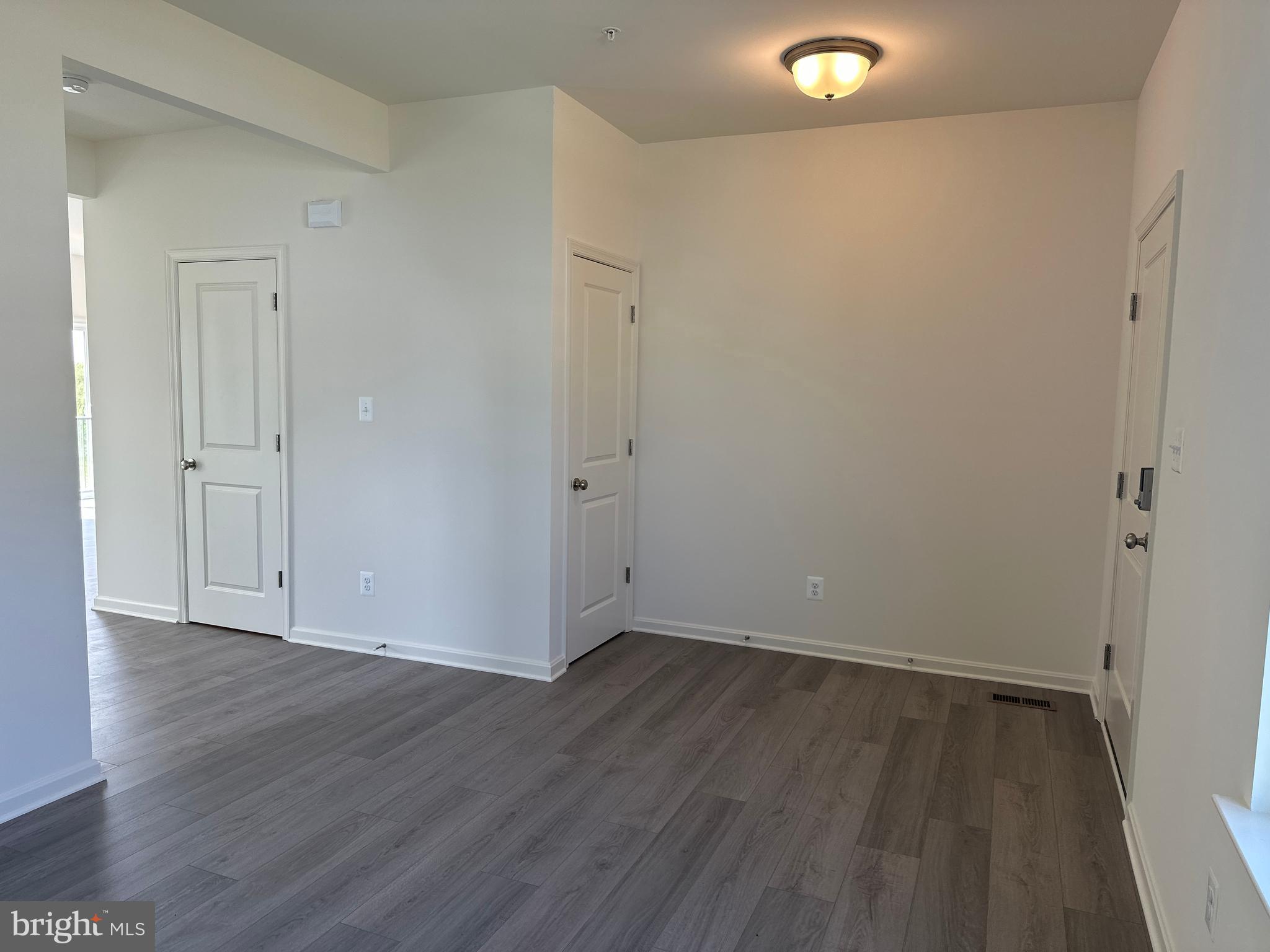 60 Chase Circle Elkton, MD 21921 - Photo 6 of 48 a view of an empty room with wooden floor