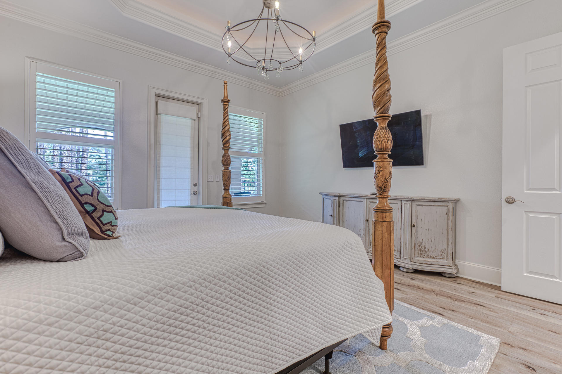 160 Grand Flora Way Santa Rosa Beach, FL 32459 - Photo 12 of 51 a bedroom with a bed and flat screen tv