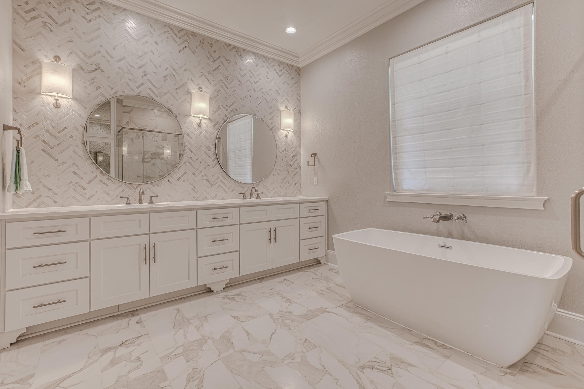 160 Grand Flora Way Santa Rosa Beach, FL 32459 - Photo 16 of 51 a spacious bathroom with a double vanity sink mirror and bathtub