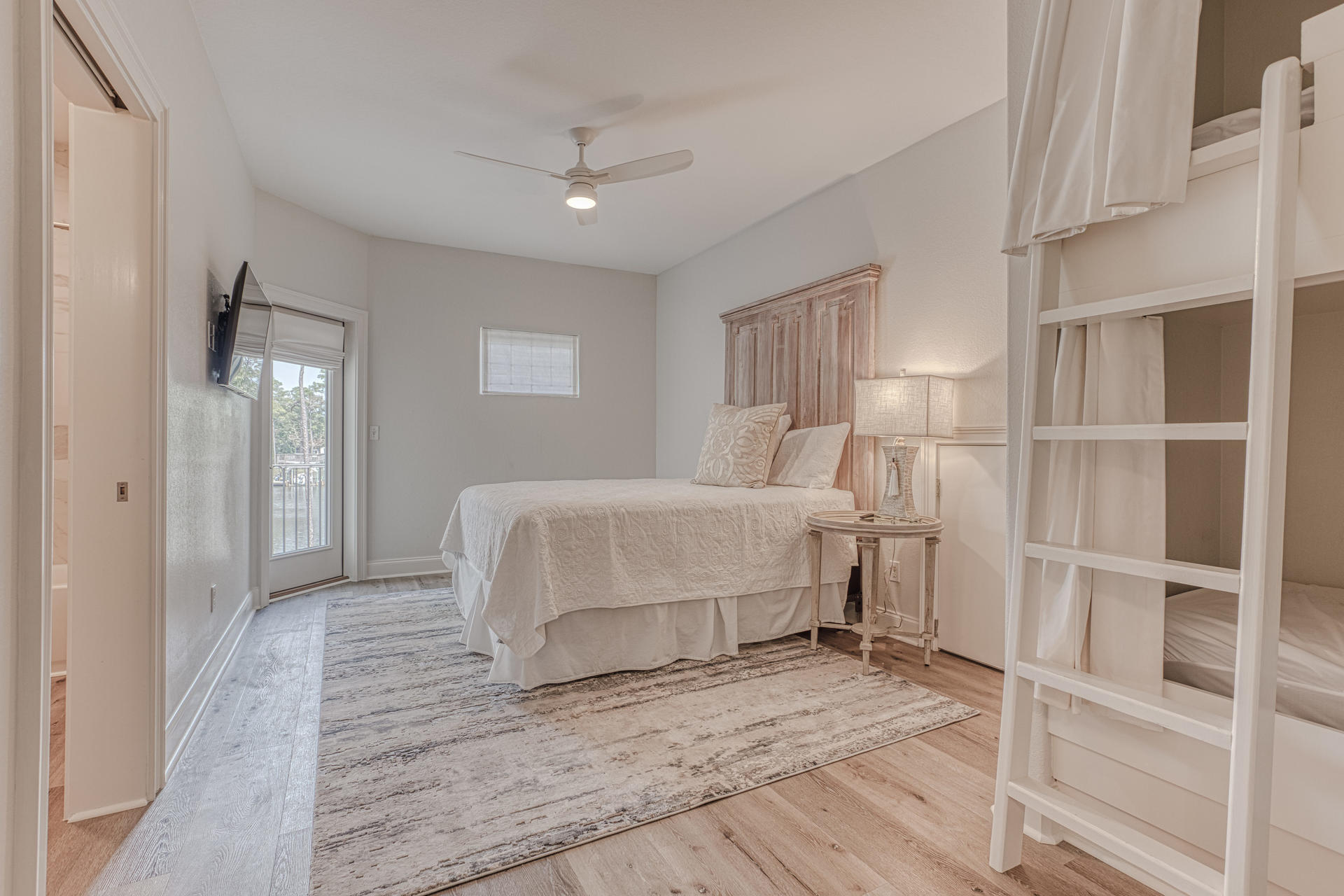 160 Grand Flora Way Santa Rosa Beach, FL 32459 - Photo 33 of 51 a bedroom with a bed and a window