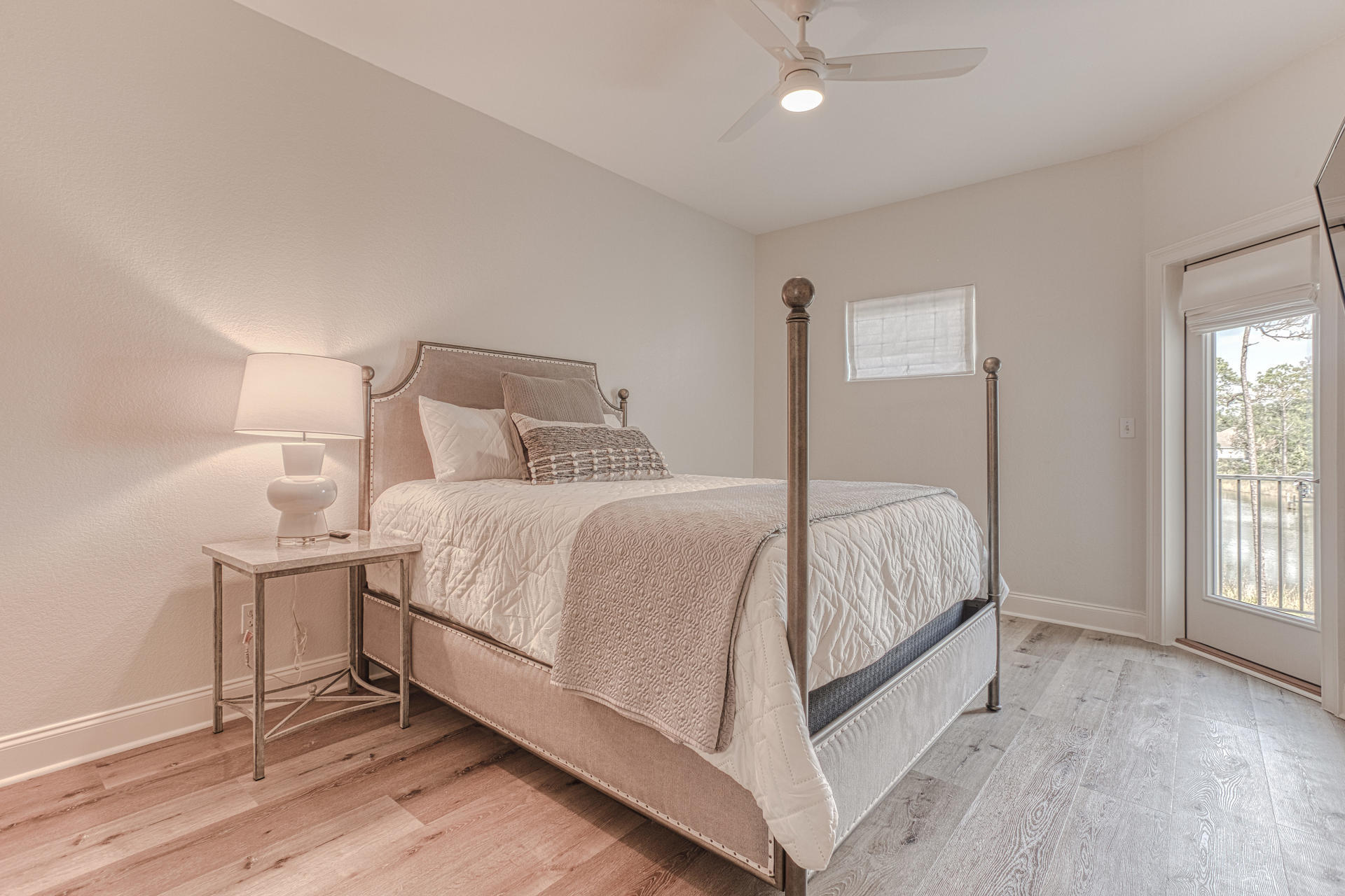 160 Grand Flora Way Santa Rosa Beach, FL 32459 - Photo 39 of 51 a bed room with a bed and a night stand