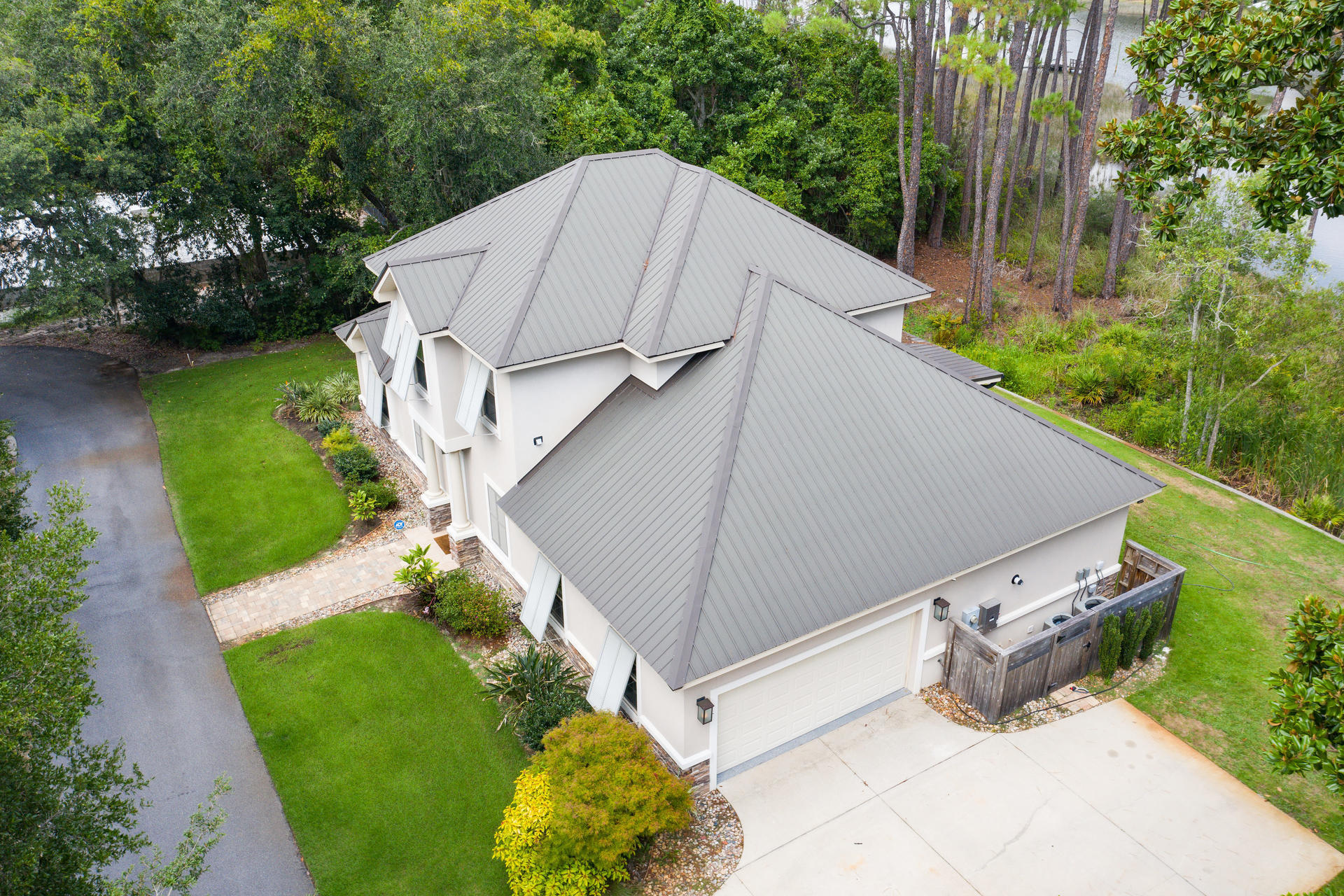 160 Grand Flora Way Santa Rosa Beach, FL 32459 - Photo 46 of 51 a aerial view of a house with yard and a fountain