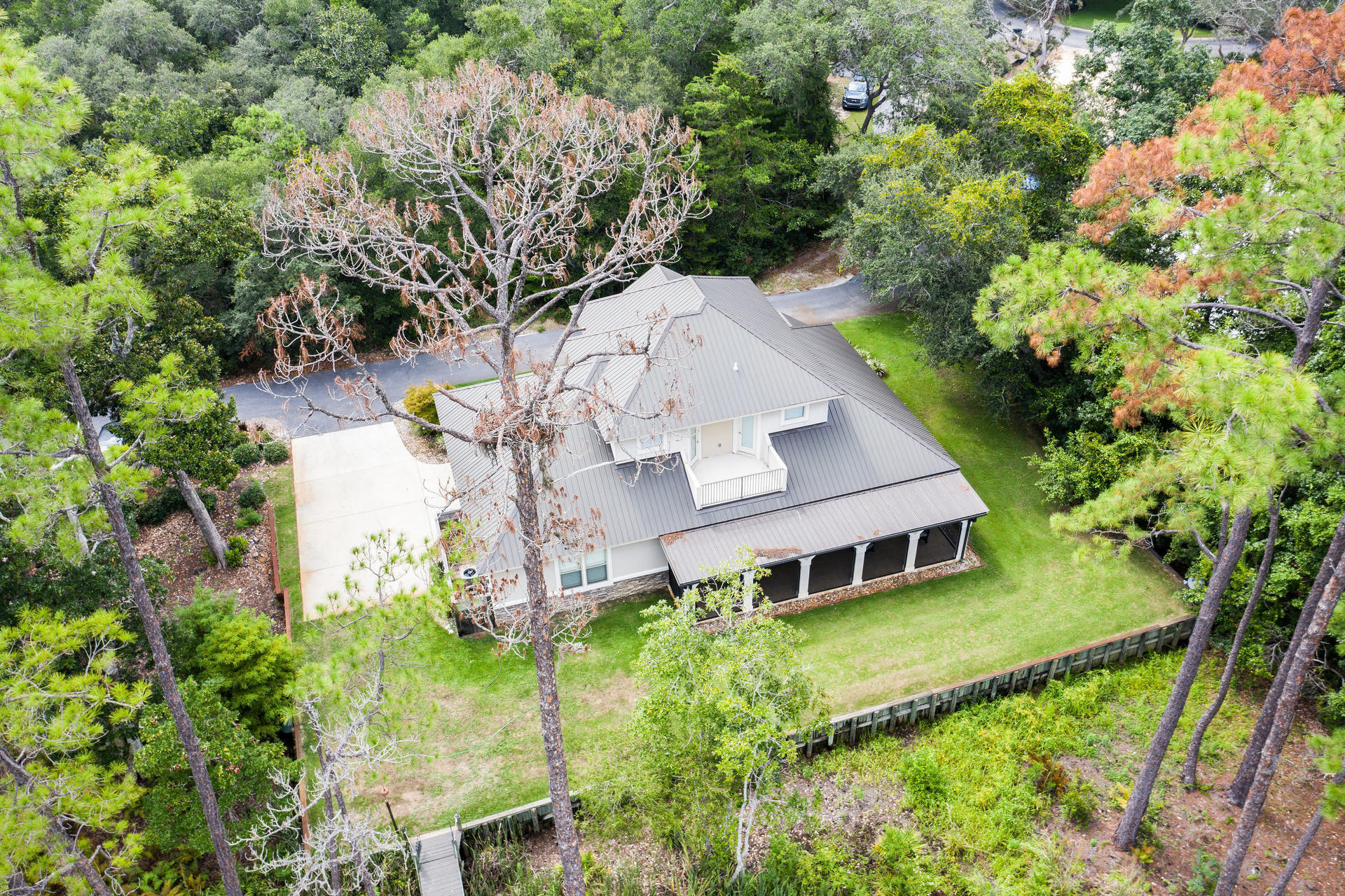 160 Grand Flora Way Santa Rosa Beach, FL 32459 - Photo 51 of 51 an aerial view of a house with a yard