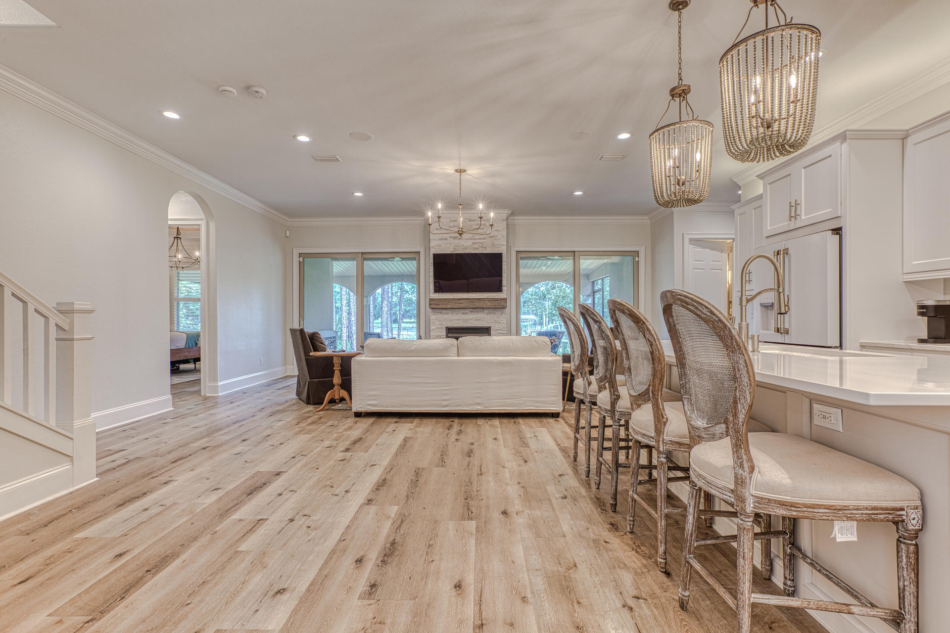 160 Grand Flora Way Santa Rosa Beach, FL 32459 - Photo 7 of 51 a view of a room with furniture and wooden floor