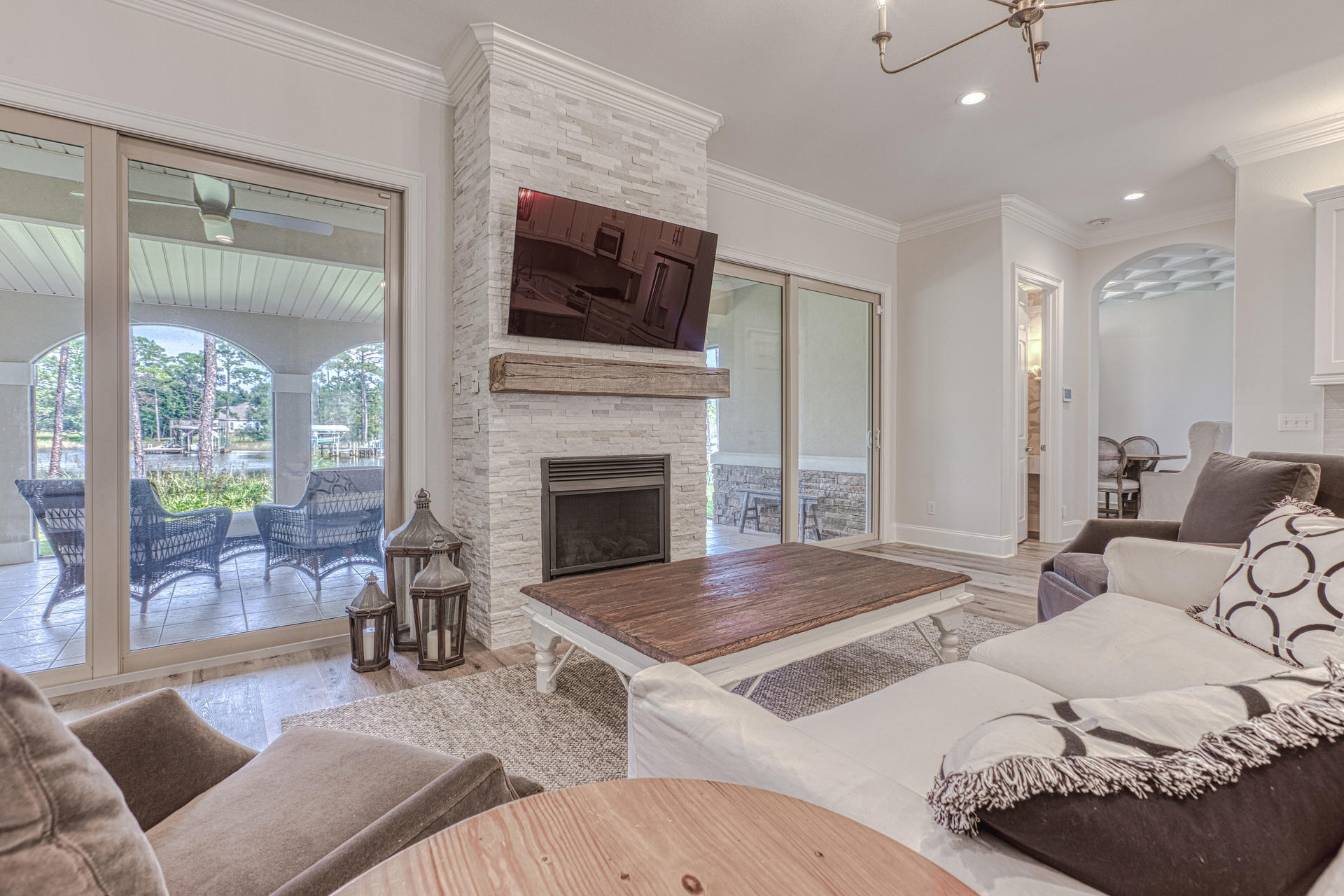 160 Grand Flora Way Santa Rosa Beach, FL 32459 - Photo 9 of 51 a living room with furniture and a fireplace