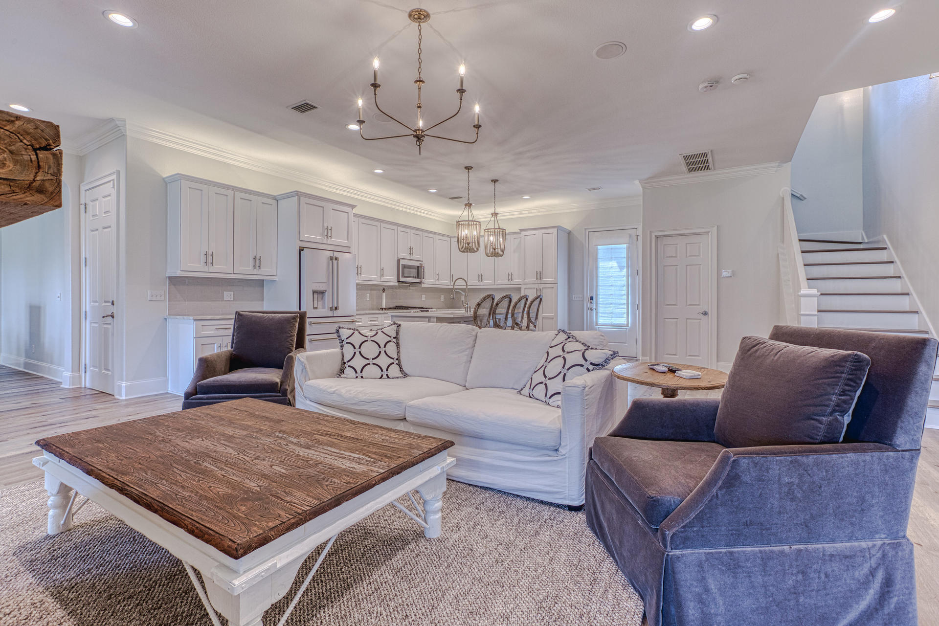 160 Grand Flora Way Santa Rosa Beach, FL 32459 - Photo 10 of 51 a living room with furniture and a chandelier