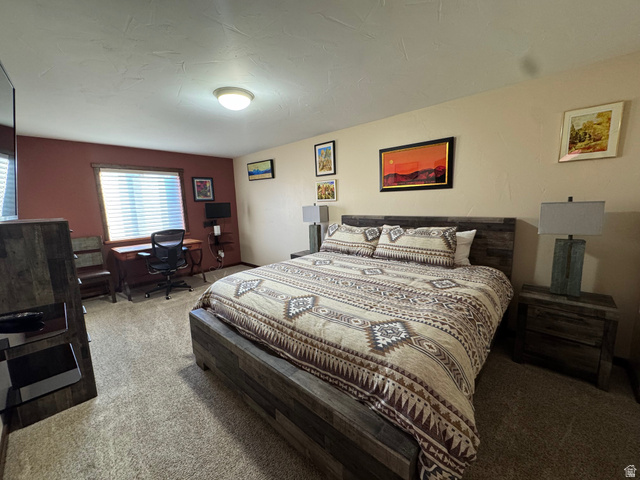 3439 Westwater Road Moab, UT 84532 - Photo 47 of 64 Carpeted bedroom with a desk