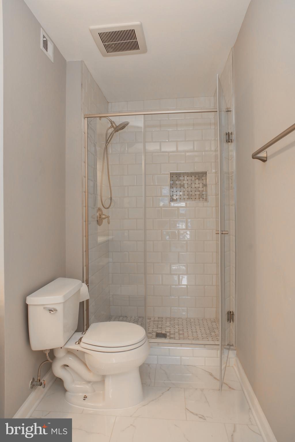 11616 Ivystone Court, Unit 301 Reston, VA 20191 - Photo 20 of 29 a bathroom with a toilet and a shower