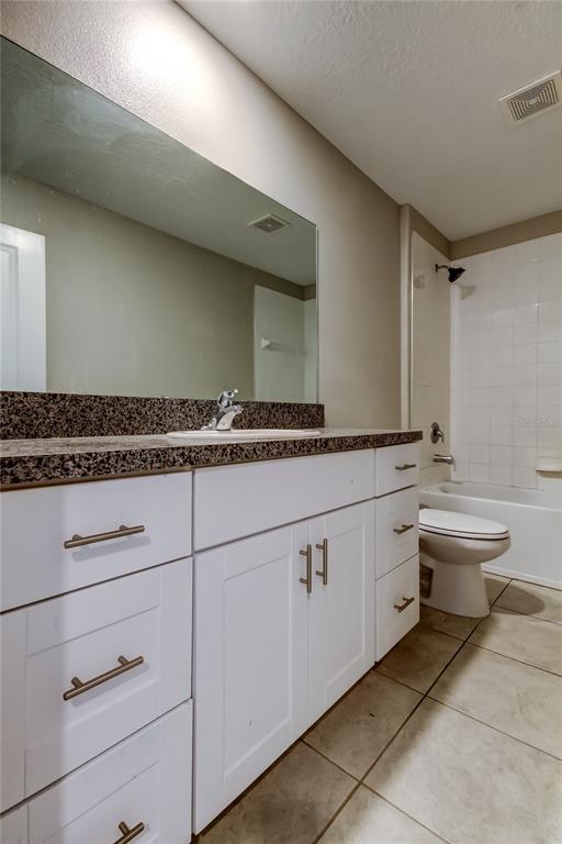 6362 Spider Lily Way New Port Richey, FL 34653 - Photo 40 of 47 a bathroom with a sink and a mirror